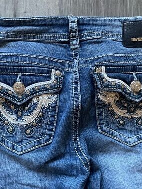 Women's Blue Flare Jeans with Subtle Wash